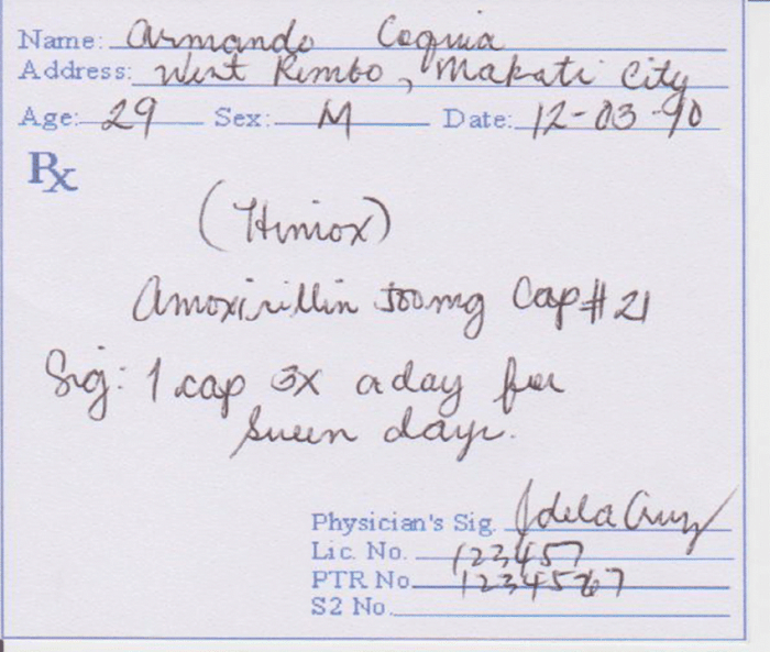 Prescription doctor signing amoxycillin