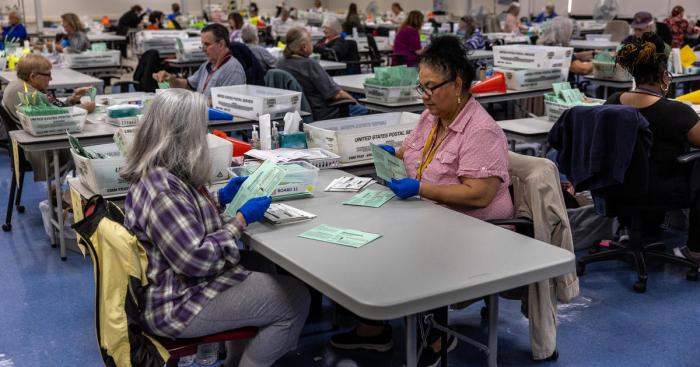 Ballots counting pima county tucson early election workers ballot cordova ins polling emma walk process left place elections